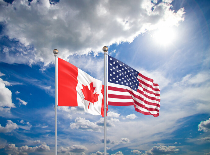 USA and Canada flags represent border