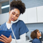 A Nurse answers a phone